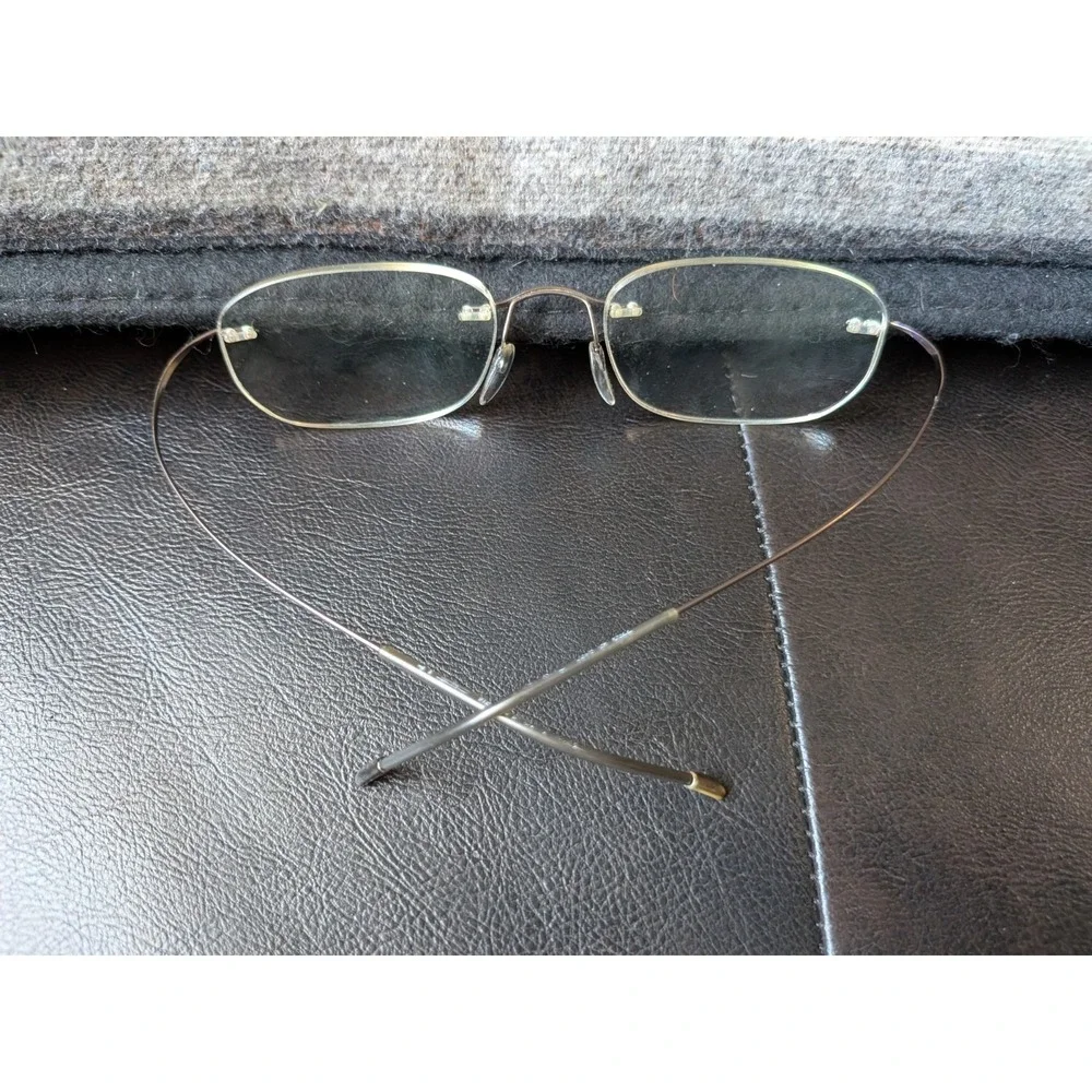Silhouette Eyeglasses 7799 40 6102 Titan Rimless Frame Austria 49[]19 150